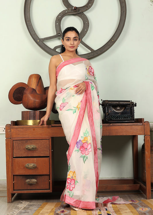 white handpainted and handwork saree with unstitched blouse