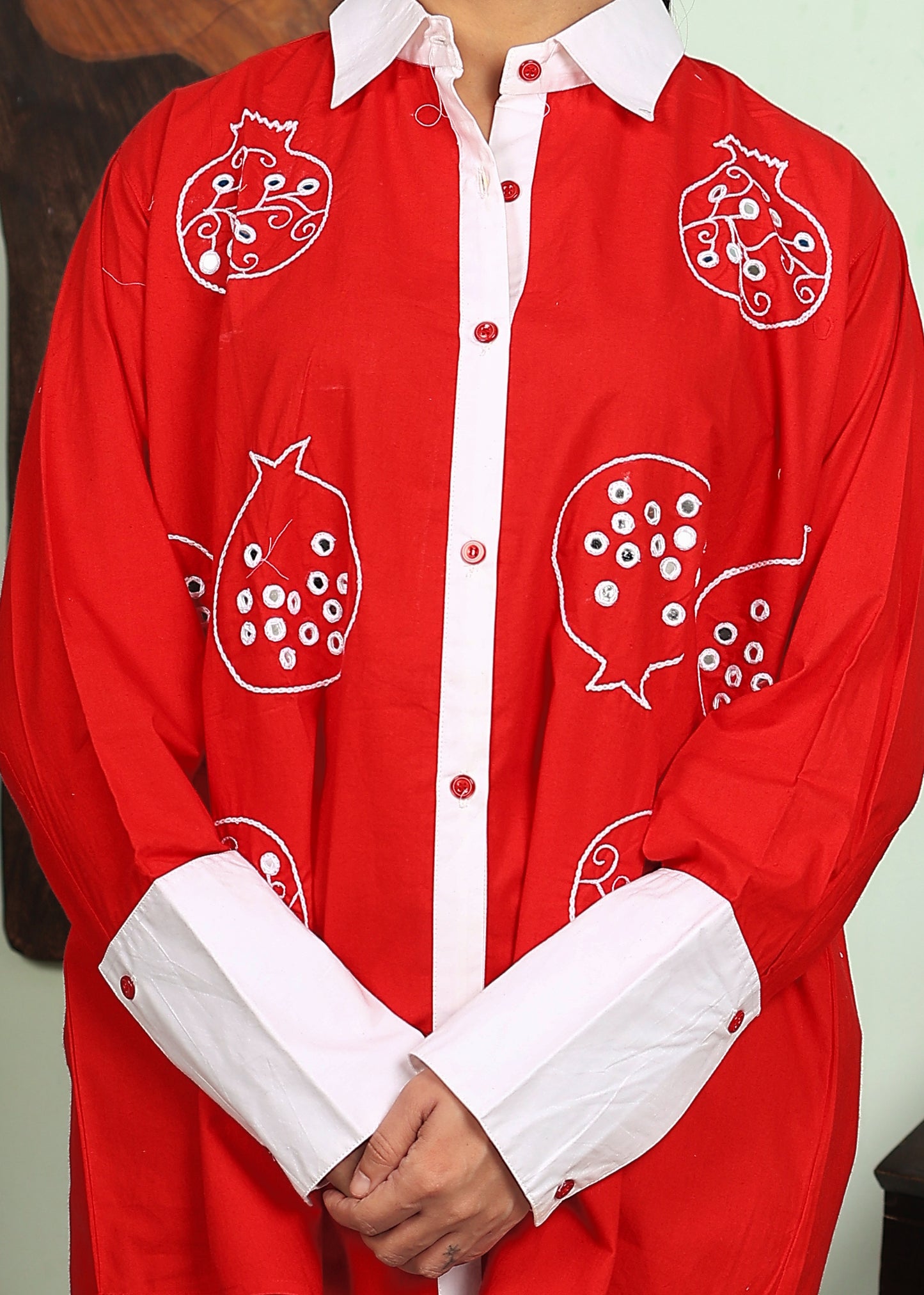 red shirt with white collar and cuffs  with handwork