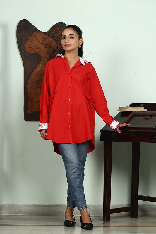 red shirt with embellishment on collar and cuff