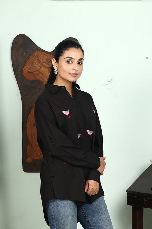 black shirt with birds