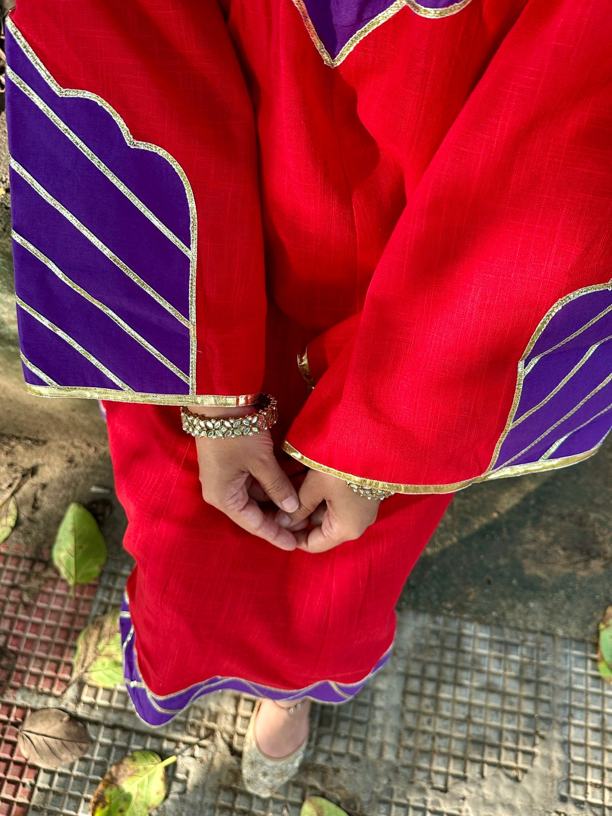 red kurta with dhoti pants with gota details