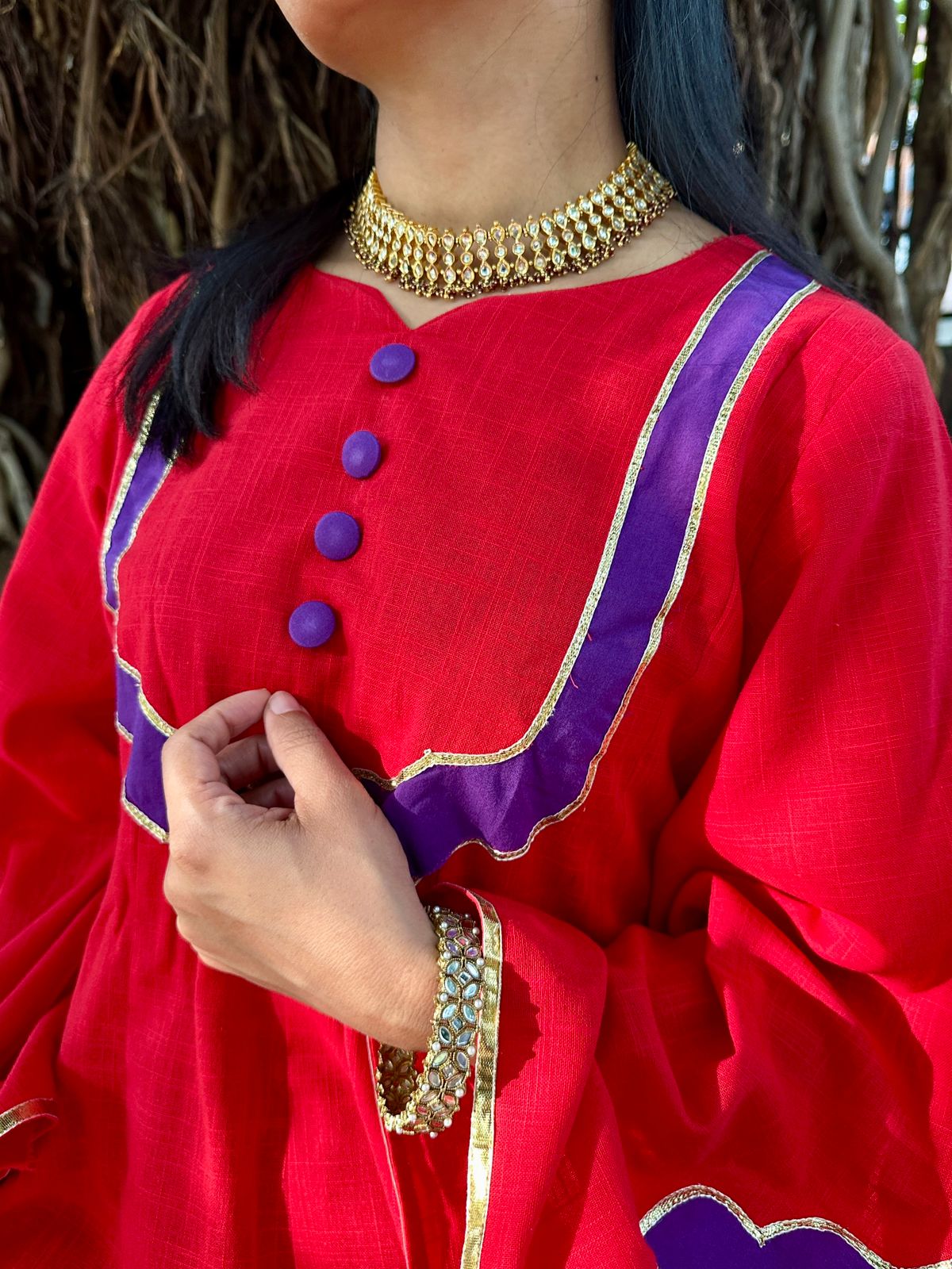 red kurta with dhoti pants with gota details