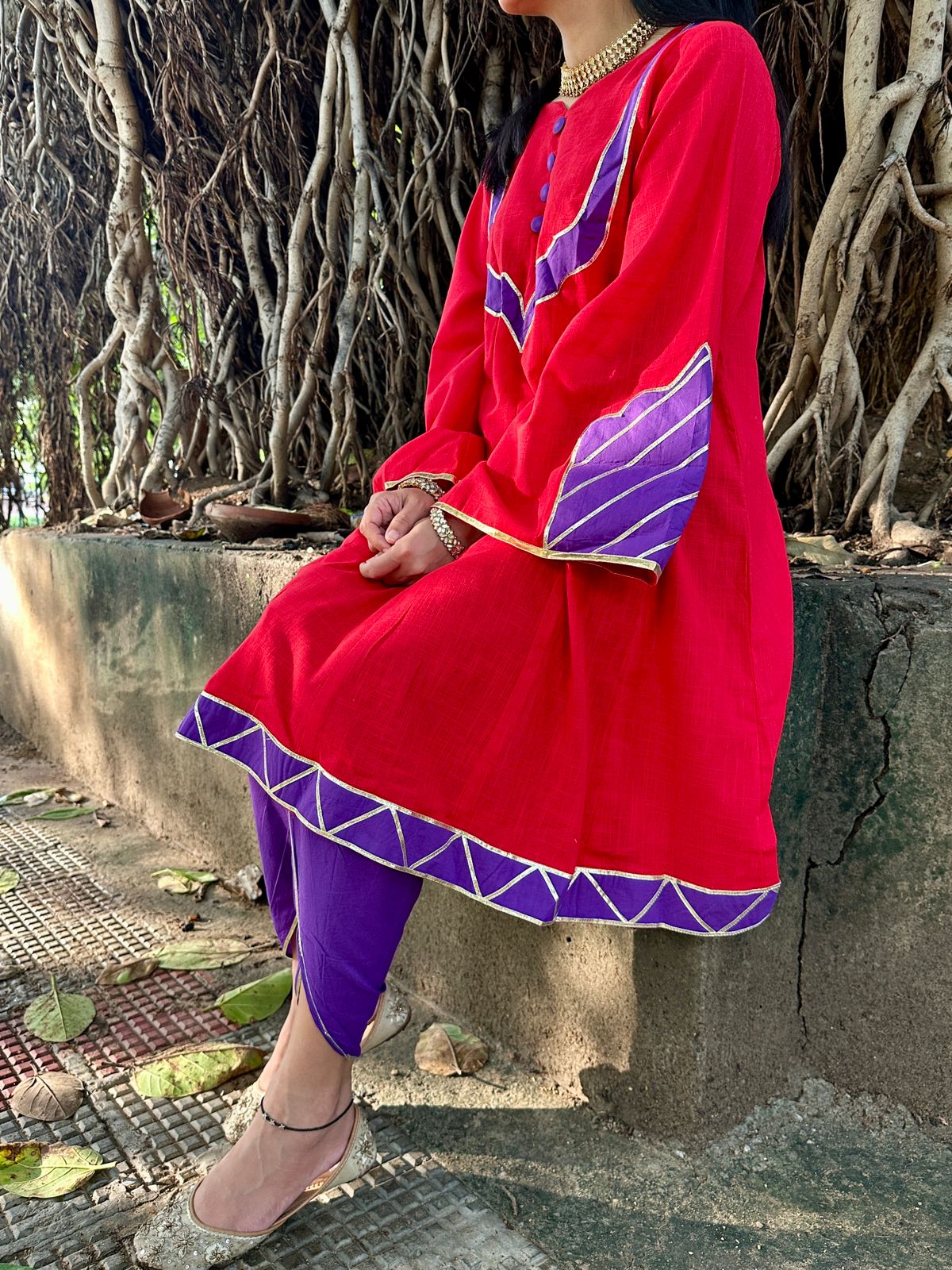 red kurta with dhoti pants with gota details