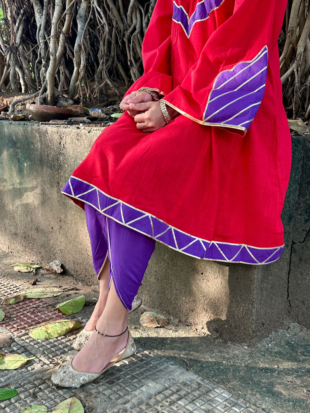 red kurta with dhoti pants with gota details