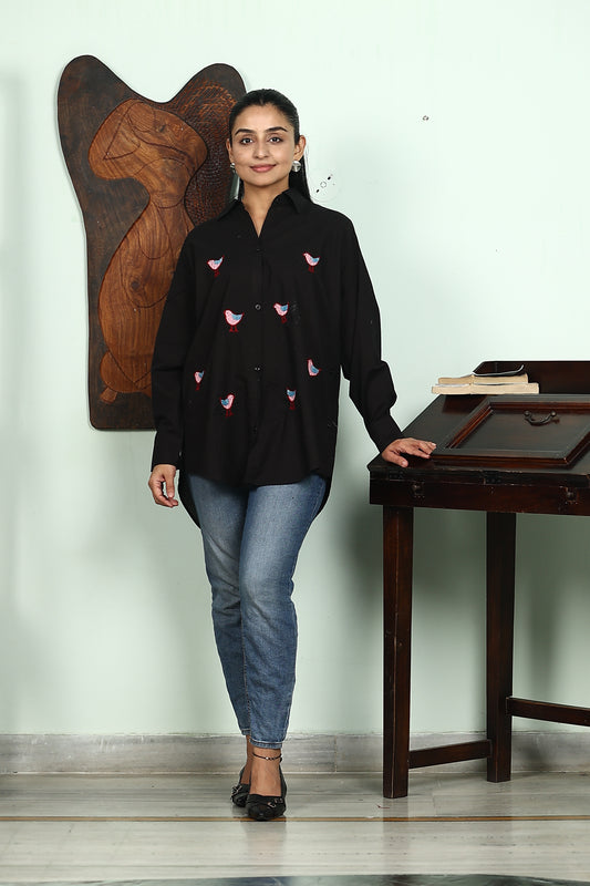 black shirt with birds