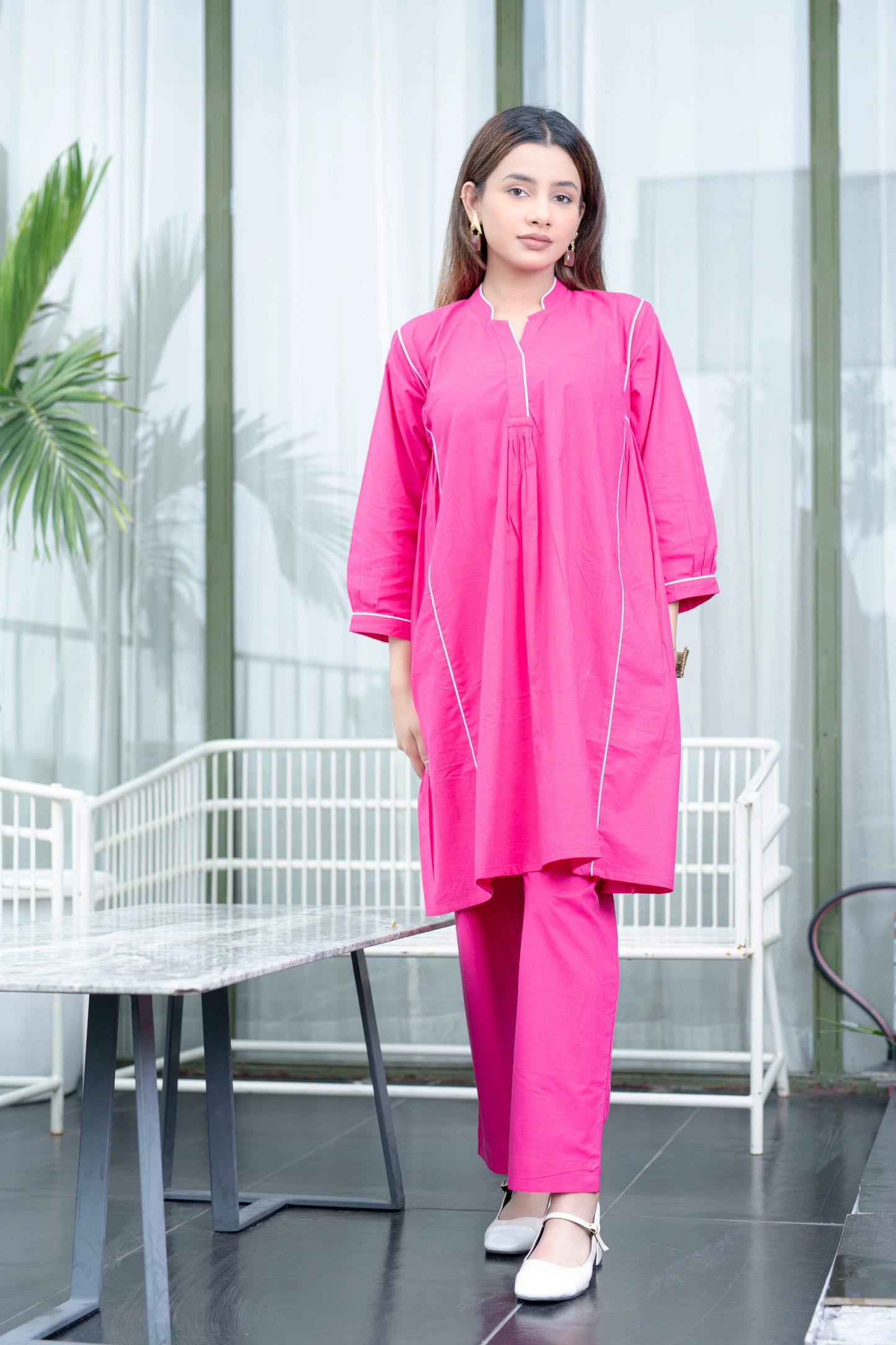 Rosa Kurta und Hose