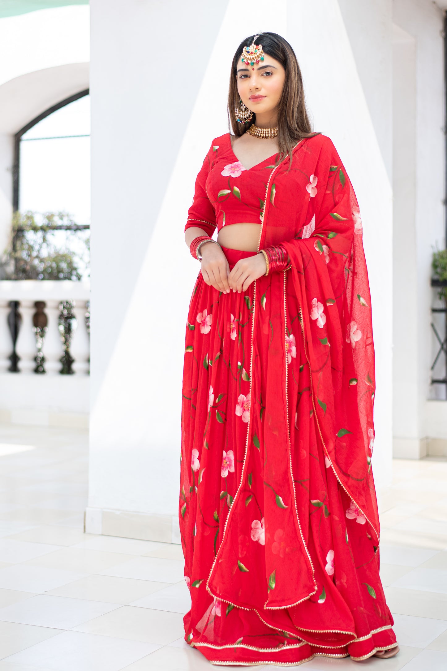 red chiffon handpainted lehenga with dupatta and blouse