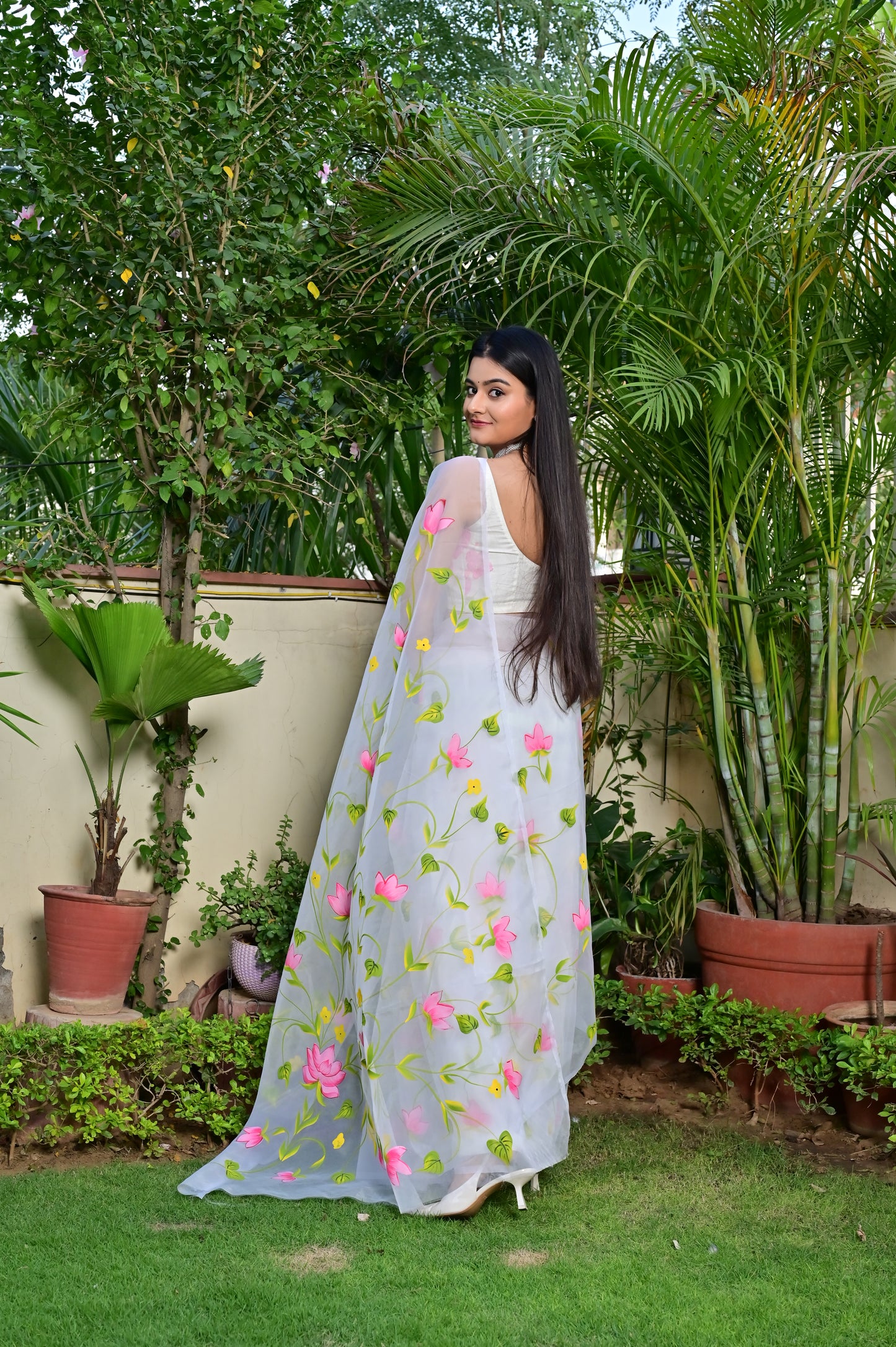 white soft organza handpainted with lotus design saree with unstitched blouse