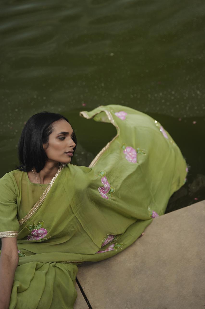 leela olive green organza handpainted and handembellished saree