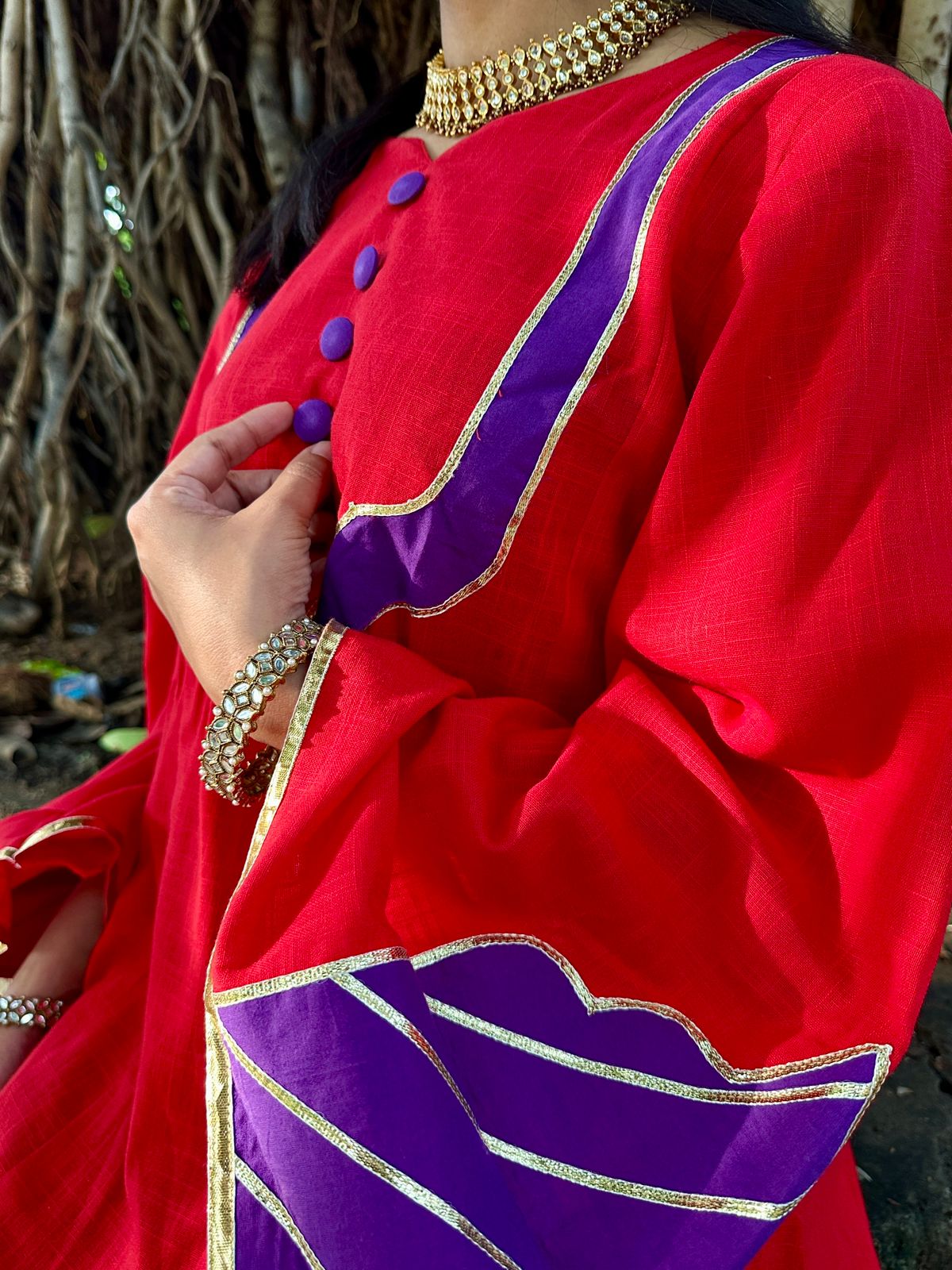 red kurta with dhoti pants with gota details